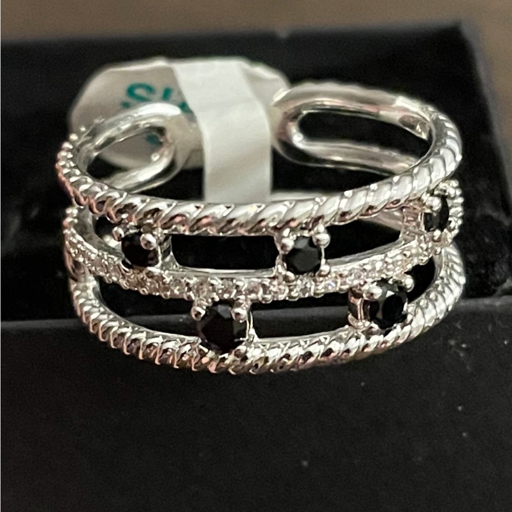Black CZ band on rhodium plating.